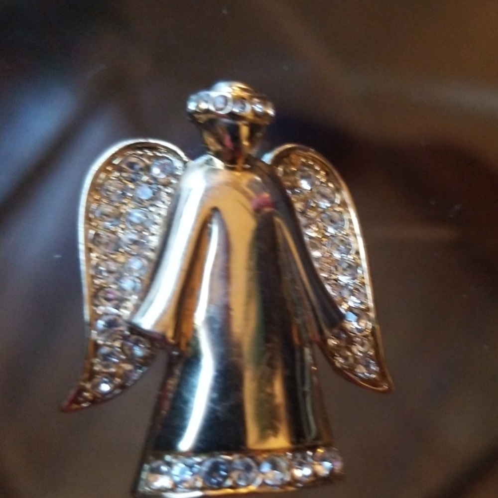 Monet angel brooch.